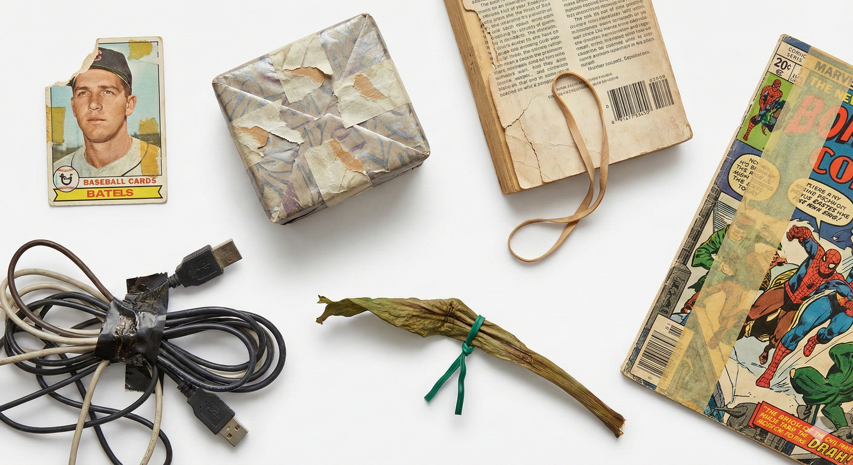 Items damaged by regular tape - vintage cards, books, and collectibles showing tape residue and damage