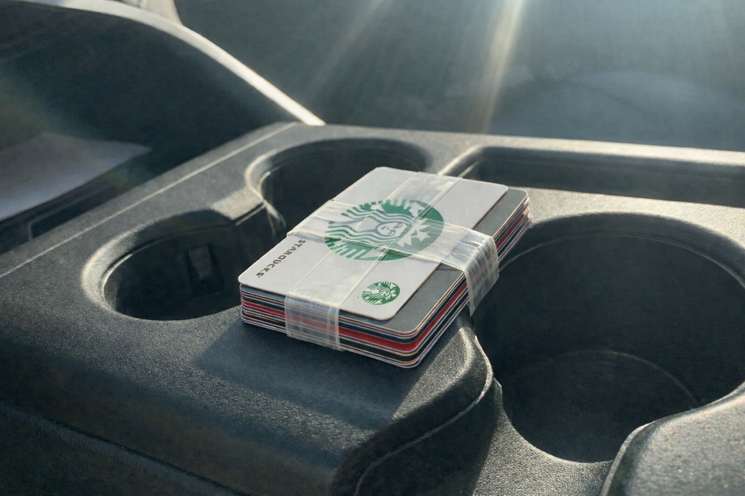 Heat resistant tape in car center console cup holders